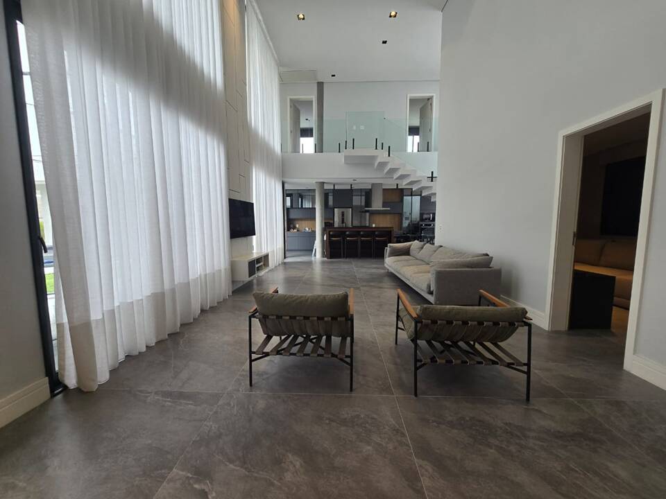 TERRA CAXAMBÚ - AT 1.000m² - AC 497m² - 5 SUÍTES - 8 VAGAS - PISCINA